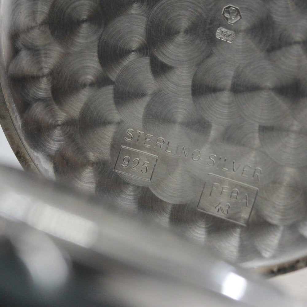 Tissot, a Swiss brand founded in 1853, has a solid silver pocket watch. This discontinued model is the Tissot-1035.