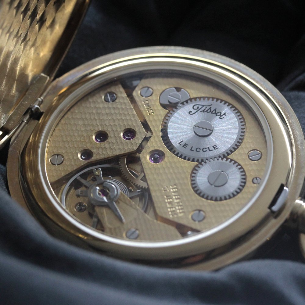 絶版モデルのティソ（TISSOT）/ ヴィンテージウォッチ / ゴールドカラーオープンフェイス / ローマン数字/ 手巻き式 / 懐中時計 / tissot-1048