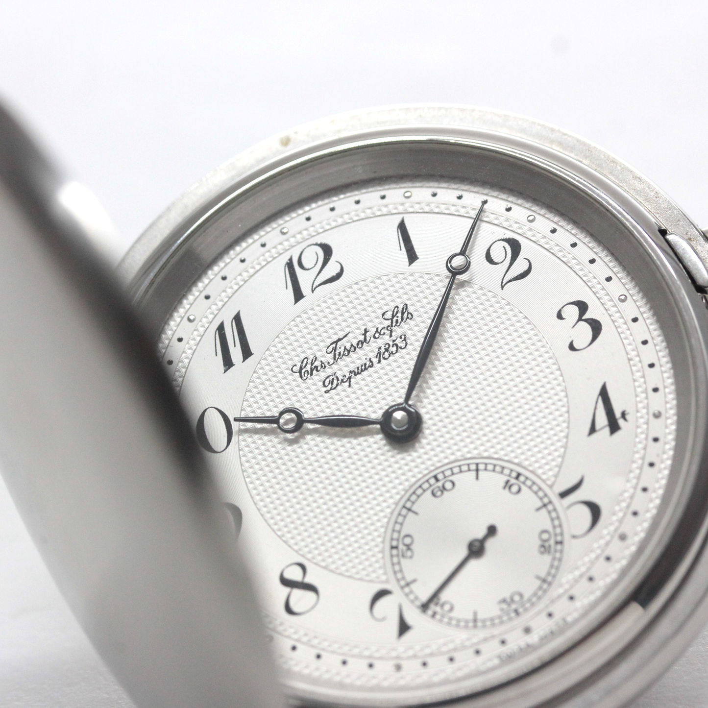 絶版モデルのティソ（TISSOT）/ ヴィンテージウォッチ / シルバーカラー ハンターケース /アラビア数字/ 手巻き式 / 懐中時計 / tissot-1052